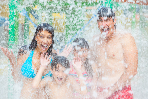 A happy family having fun at a Colorado Water Park