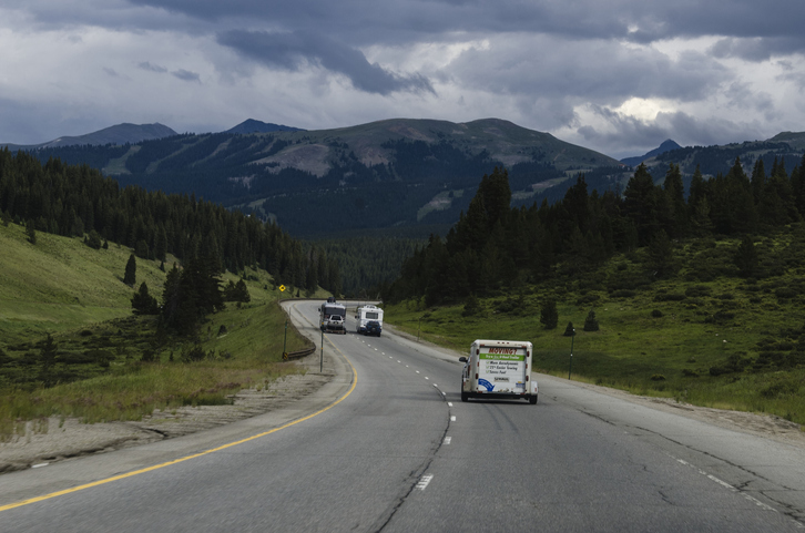 Vail, Colorado, USA - July 25, 2013: Traffic on the interstate through the Rocky Mountains near the city of Vail.